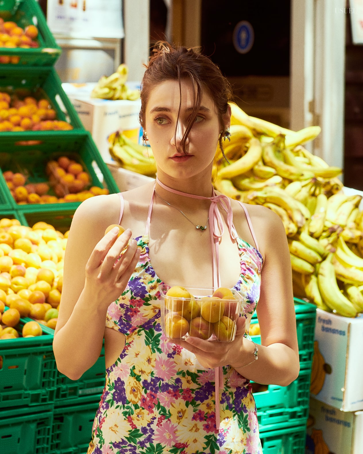 Model Sena Yapar in a floral dress at Büyükada market
