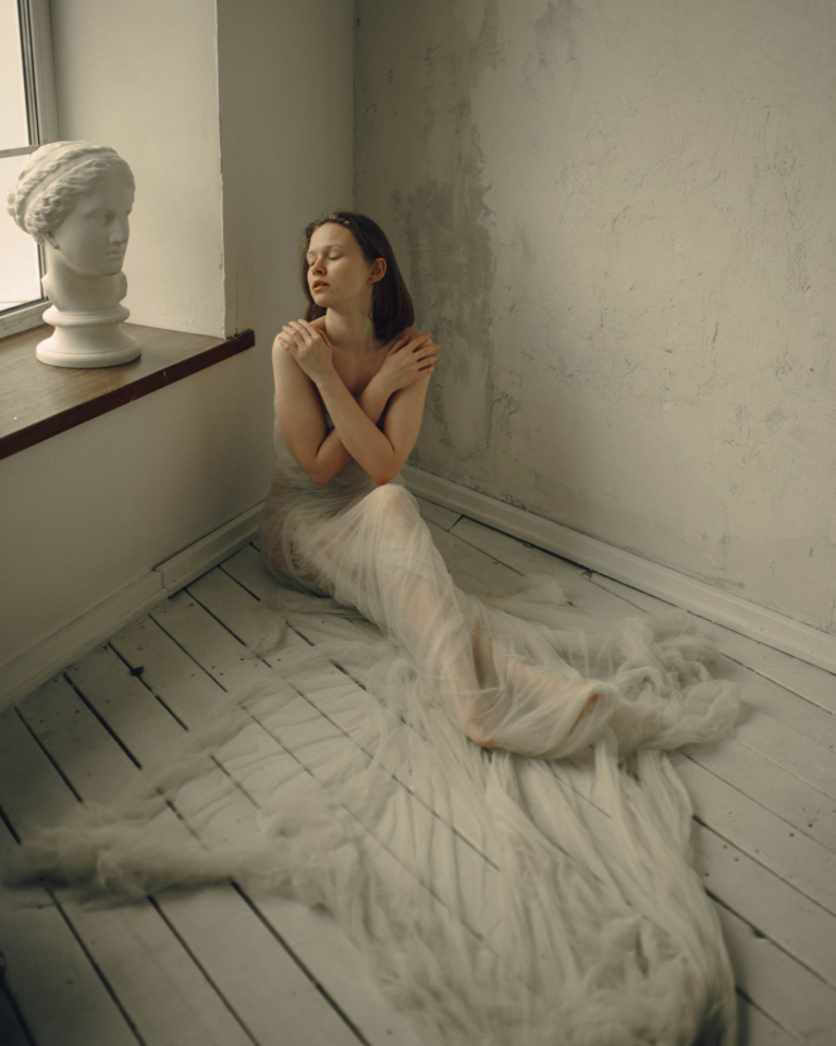 Portrait of Kapitolina Rakovskaya, a captivating and mysterious model, photographed by Vera Markevich.